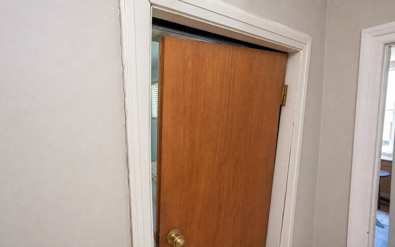 Interior door frame sticking and misaligned